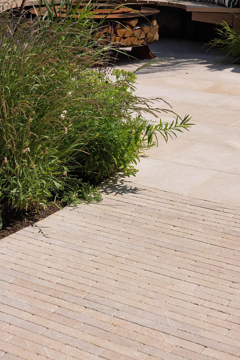 Paving details of clay pavers and limestone